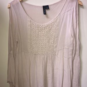 Long sleeve flowy shirt.